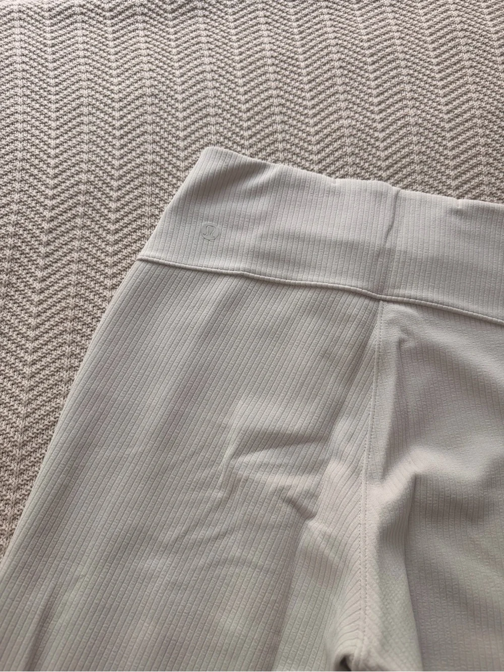 Lululemon ribbed softstreme cream ribbed flare pant in a size 4